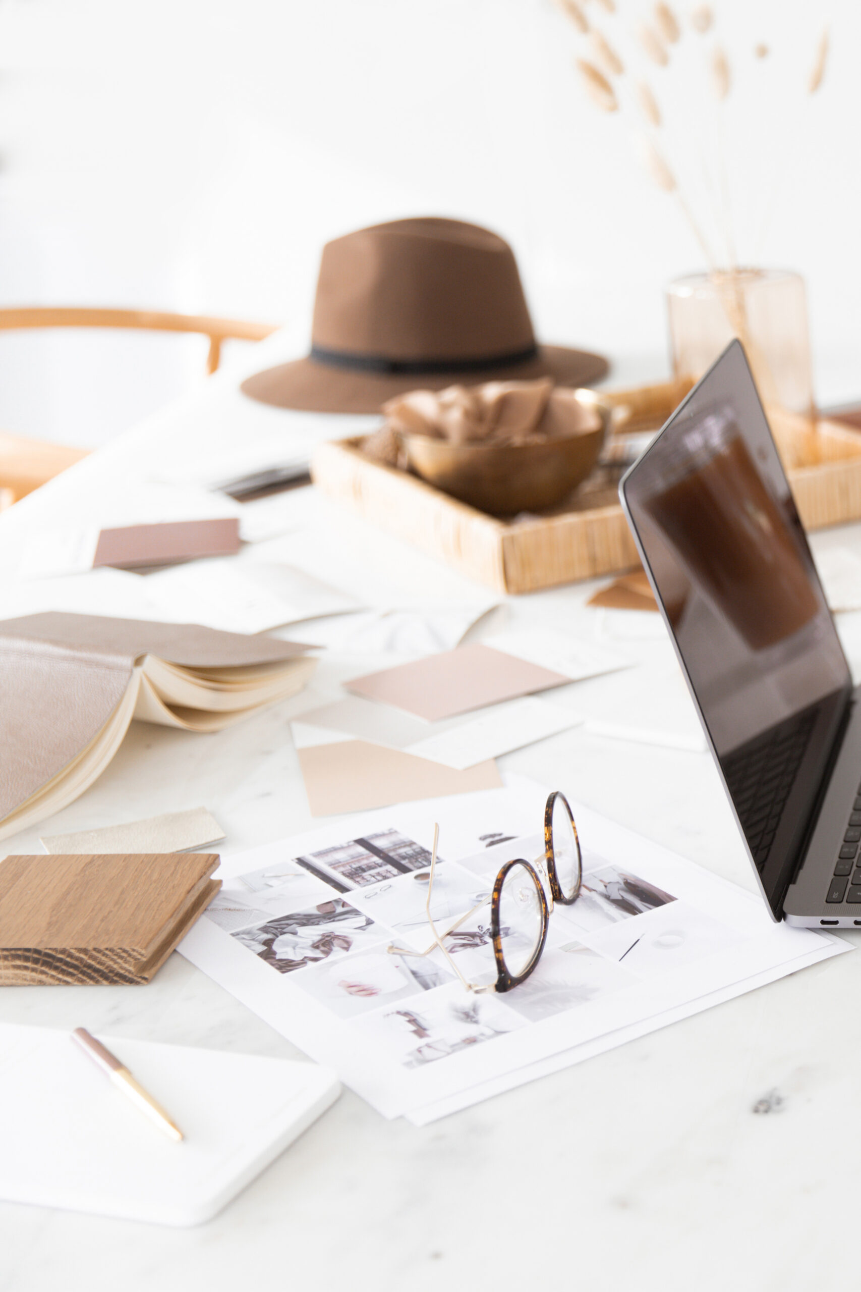 surrounded by multiple notebooks and projects representing too many interests and difficulty focusing on one thing