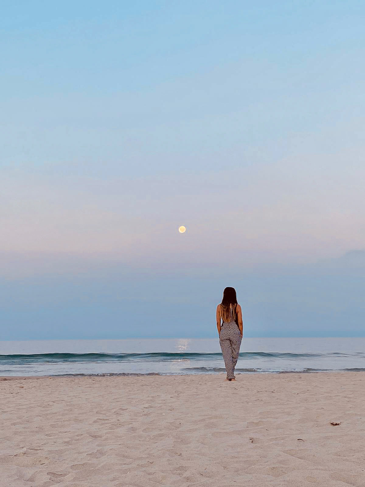 Woman embracing seasonal living and managing seasonal affective disorder through self-awareness and seasonal routines.